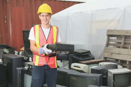 Professional waste removal team efficiently clearing construction debris