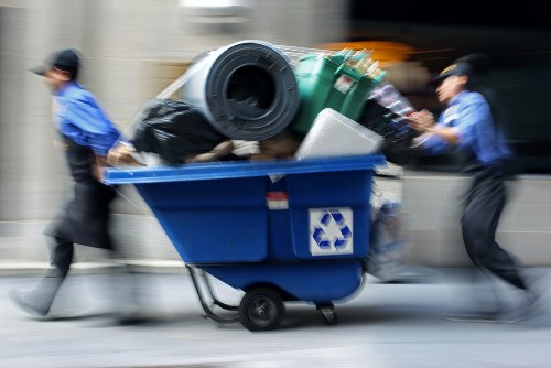 Customer service representative assisting with skip hire booking